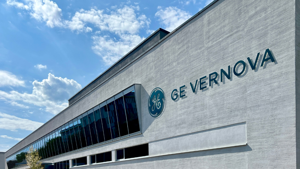 GE Vernova building exterior under a bright sky, showing energy infrastructure investment.