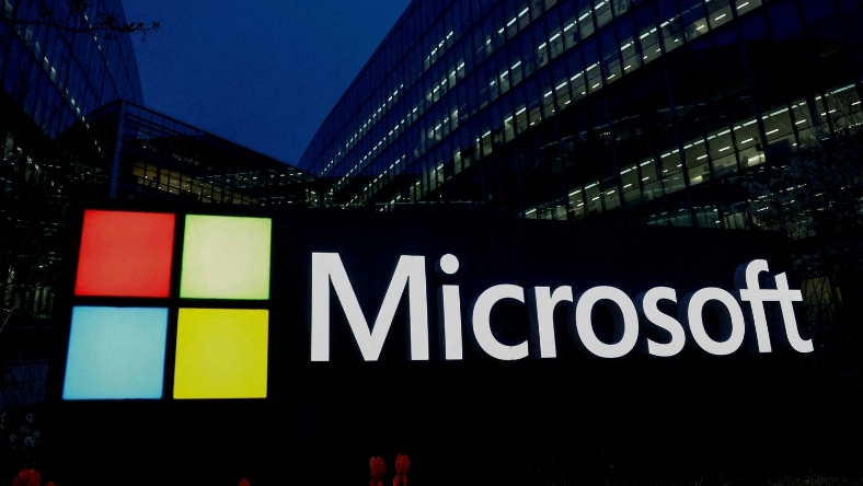Microsoft logo outside office building linked to utility grid digital partnerships